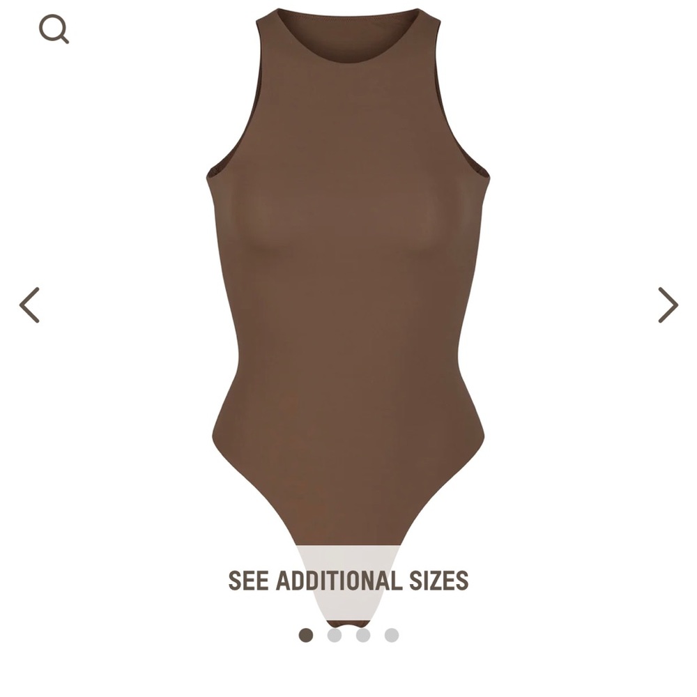 Skims Fits Everybody High Neck Bodysuit. Never worn with tags. Color Oxide